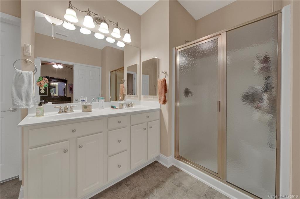 340 Garnet Court Fort Mill, SC 29708 - Photo 22 of 44 a bathroom with a double vanity sink and a mirror