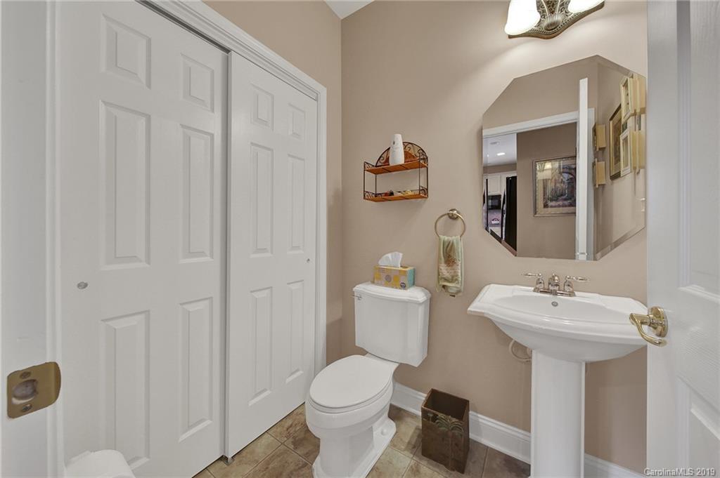 340 Garnet Court Fort Mill, SC 29708 - Photo 23 of 44 a bathroom with a toilet sink and mirror