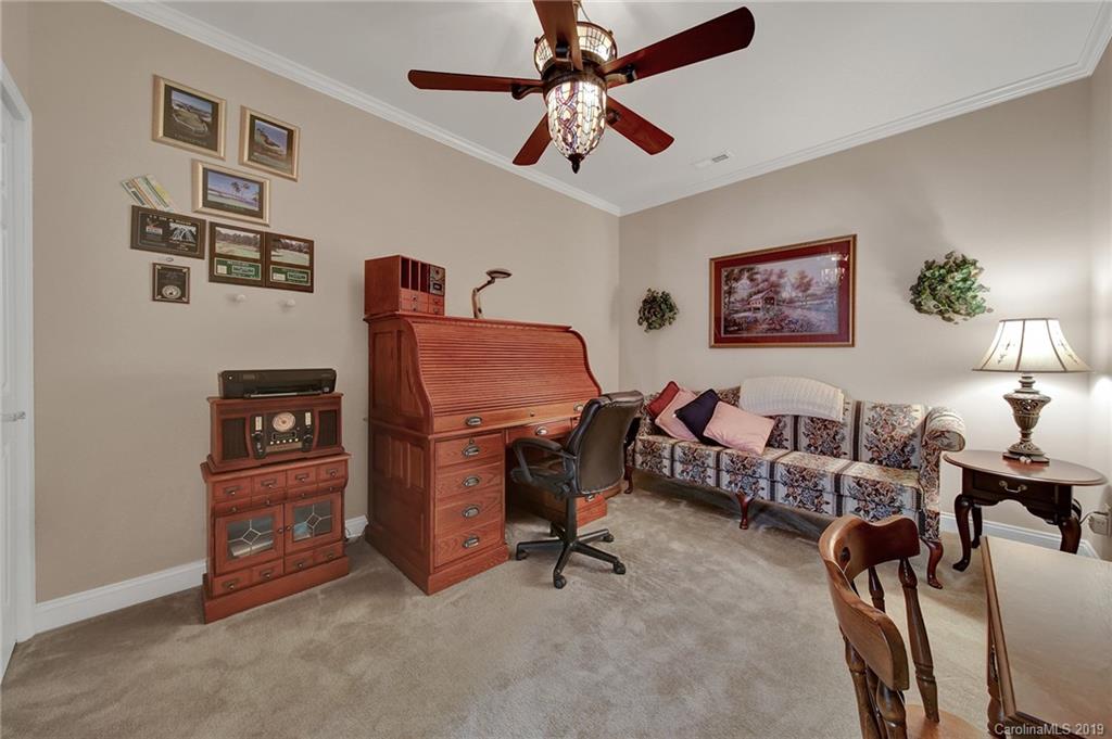 340 Garnet Court Fort Mill, SC 29708 - Photo 24 of 44 a view of a workspace with furniture and toys