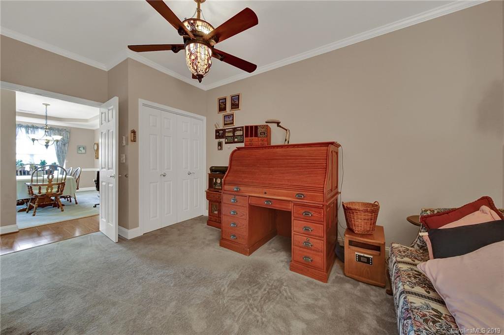 340 Garnet Court Fort Mill, SC 29708 - Photo 25 of 44 a room with furniture and a dresser