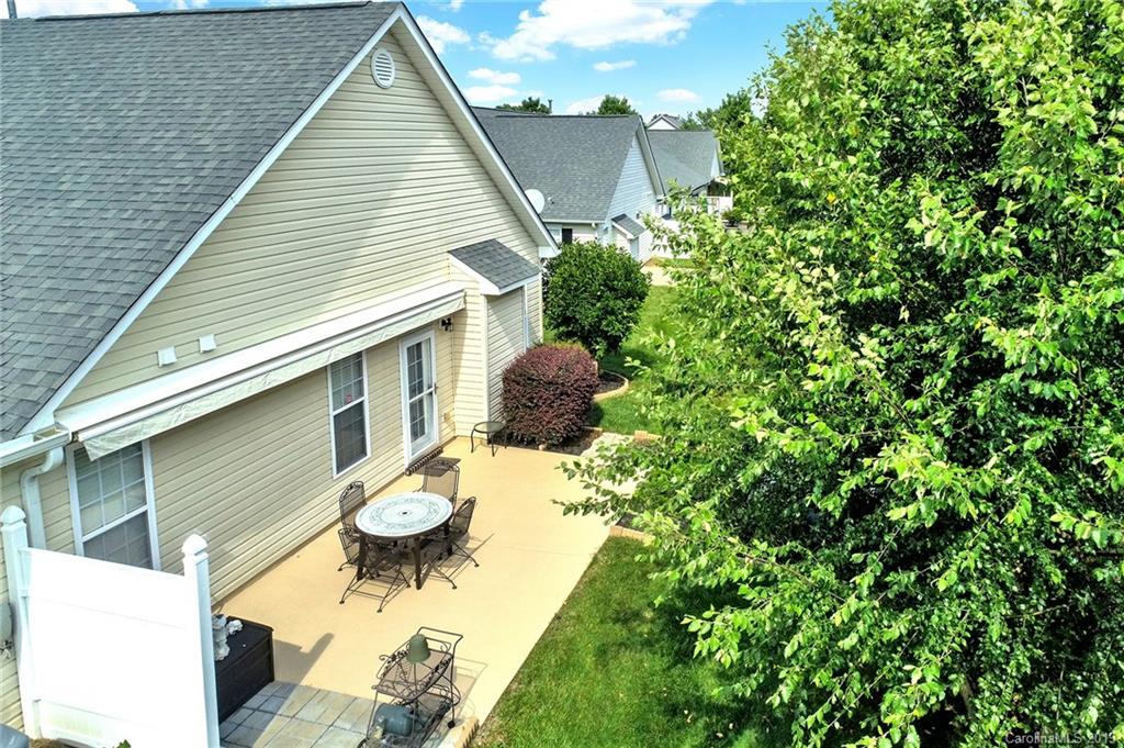 340 Garnet Court Fort Mill, SC 29708 - Photo 37 of 44 a backyard of a house with outdoor seating