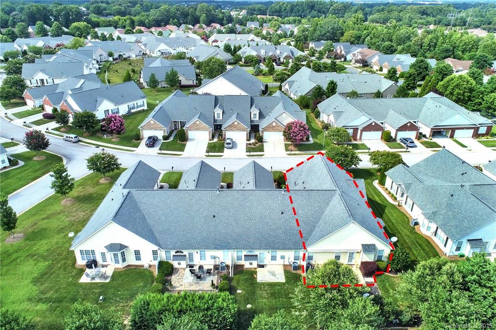340 Garnet Court Fort Mill, SC 29708 - Photo 39 of 44 an aerial view of residential houses with outdoor space and parking