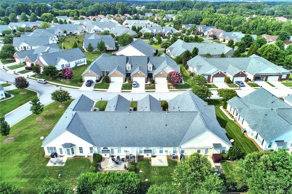 340 Garnet Court Fort Mill, SC 29708 - Photo 40 of 44 an aerial view of residential houses with outdoor space and parking