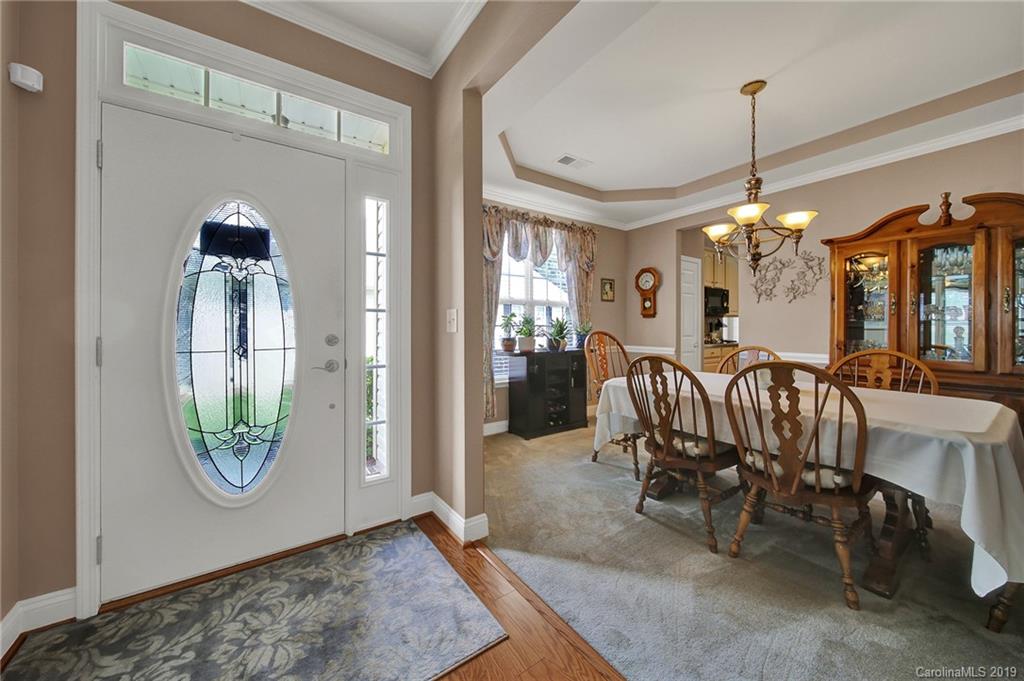 340 Garnet Court Fort Mill, SC 29708 - Photo 5 of 44 a view of a dining room with furniture window and outside view