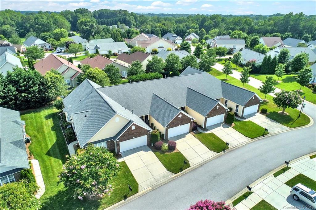 340 Garnet Court Fort Mill, SC 29708 - Photo 42 of 44 an aerial view of a house with yard swimming pool and outdoor seating