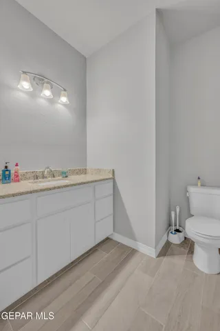 a kitchen with cabinets and window
