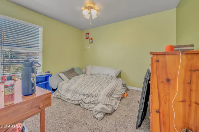 a utility room with sink dryer and washer