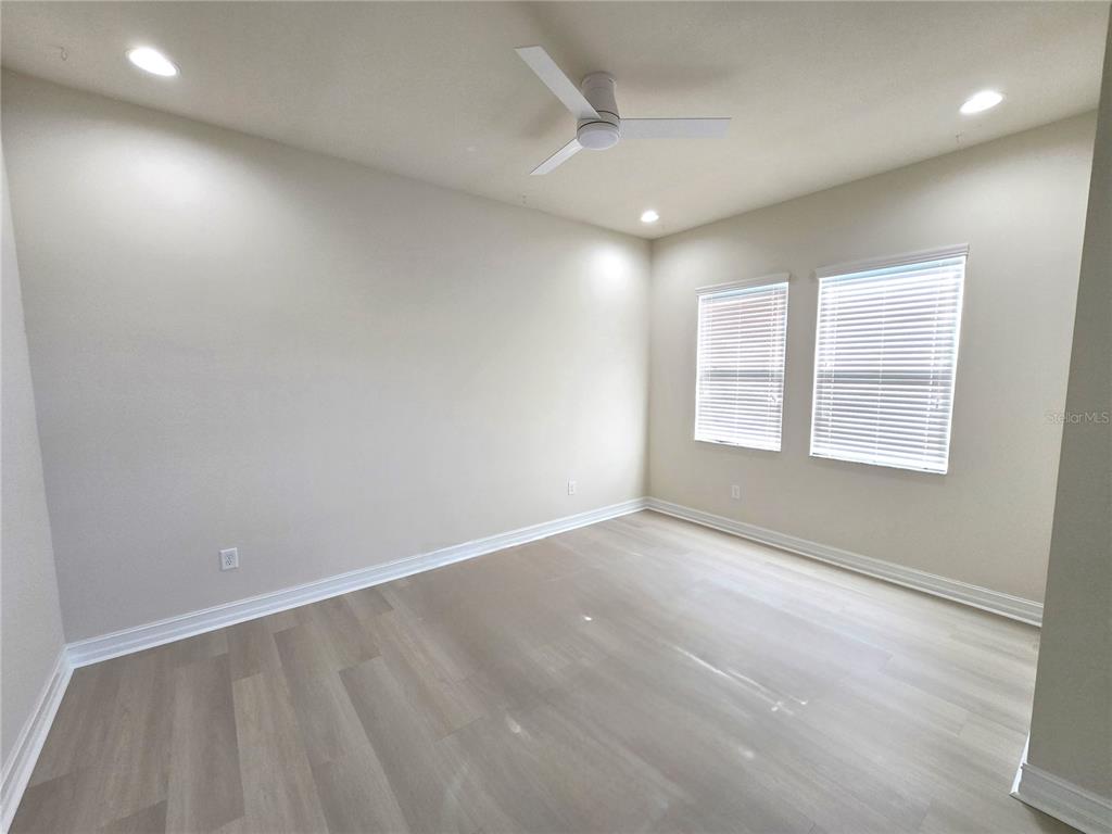 11925 Perennial Place Lakewood Ranch, FL 34211 - Photo 15 of 39 an empty room with windows