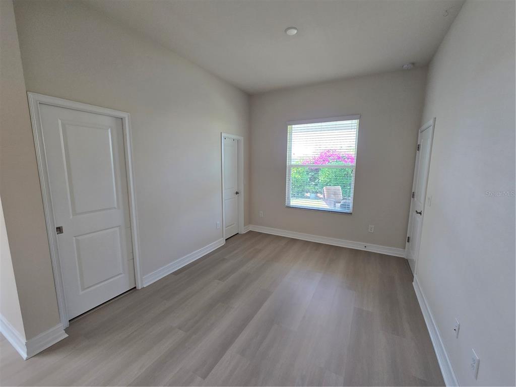 11925 Perennial Place Lakewood Ranch, FL 34211 - Photo 16 of 39 an empty room that has a window