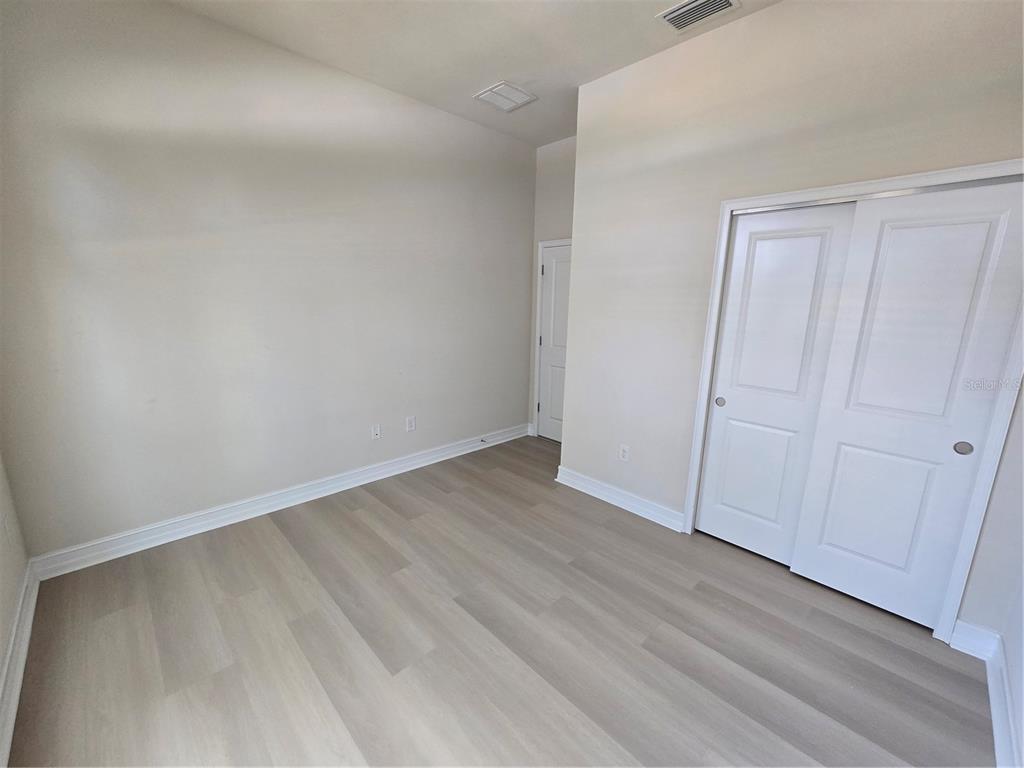 11925 Perennial Place Lakewood Ranch, FL 34211 - Photo 26 of 39 a view of an empty room