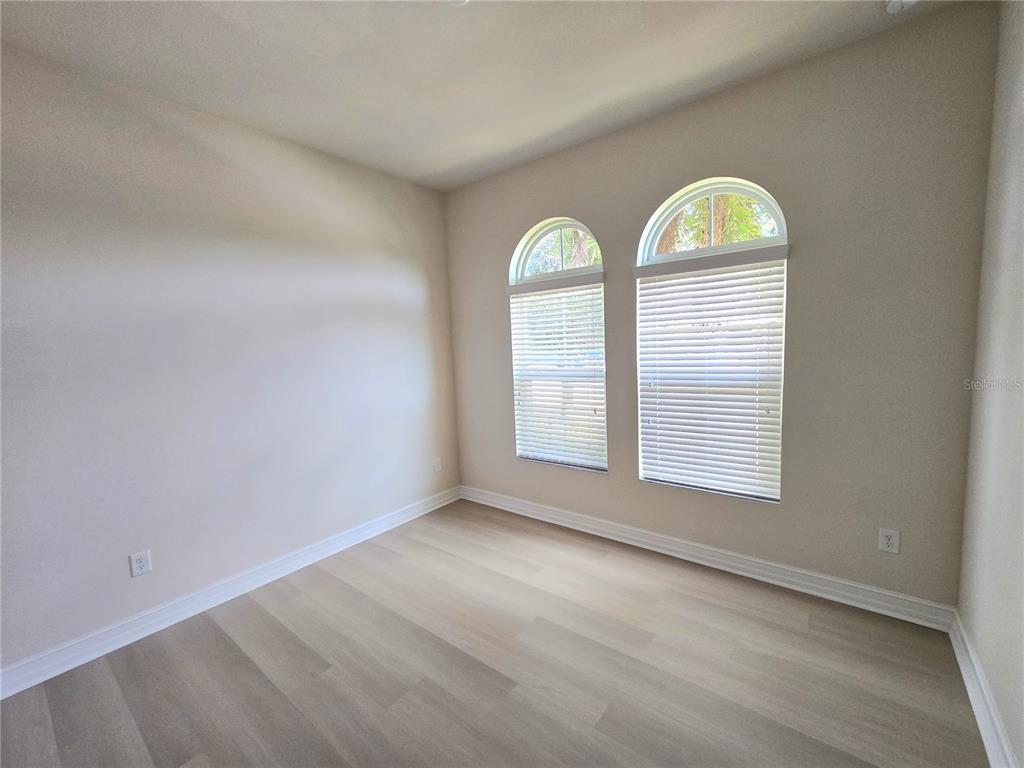 11925 Perennial Place Lakewood Ranch, FL 34211 - Photo 27 of 39 an empty room with windows