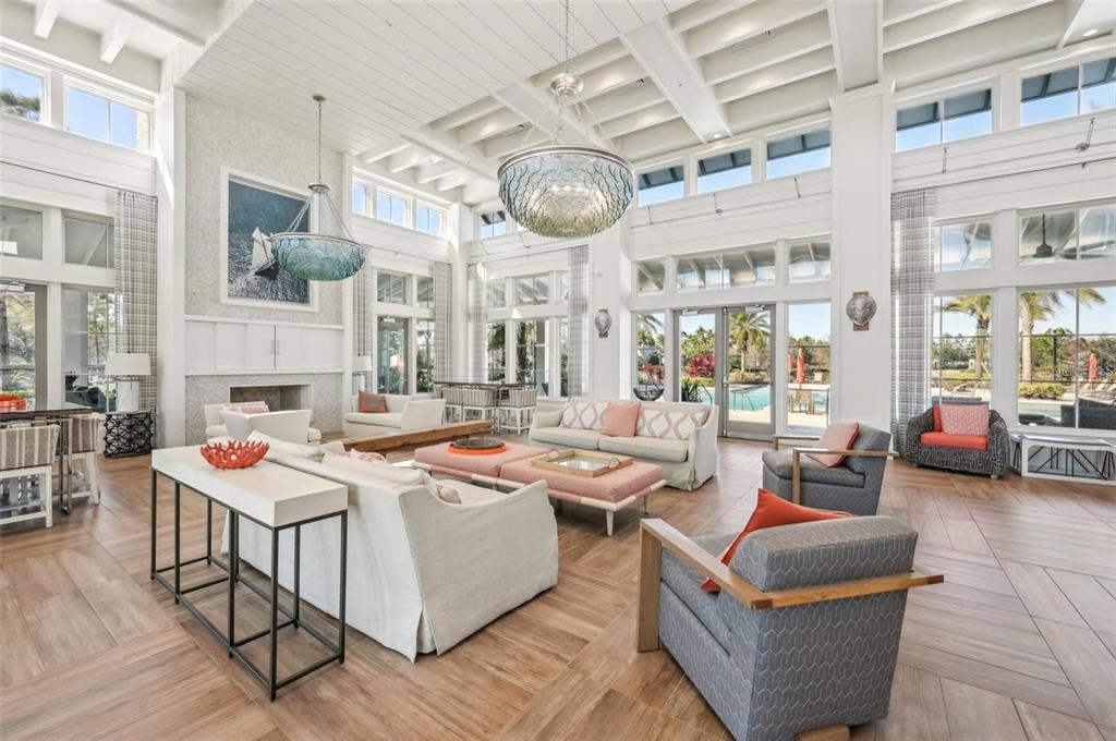 11925 Perennial Place Lakewood Ranch, FL 34211 - Photo 39 of 39 a very nice looking living room with a large window and a clock
