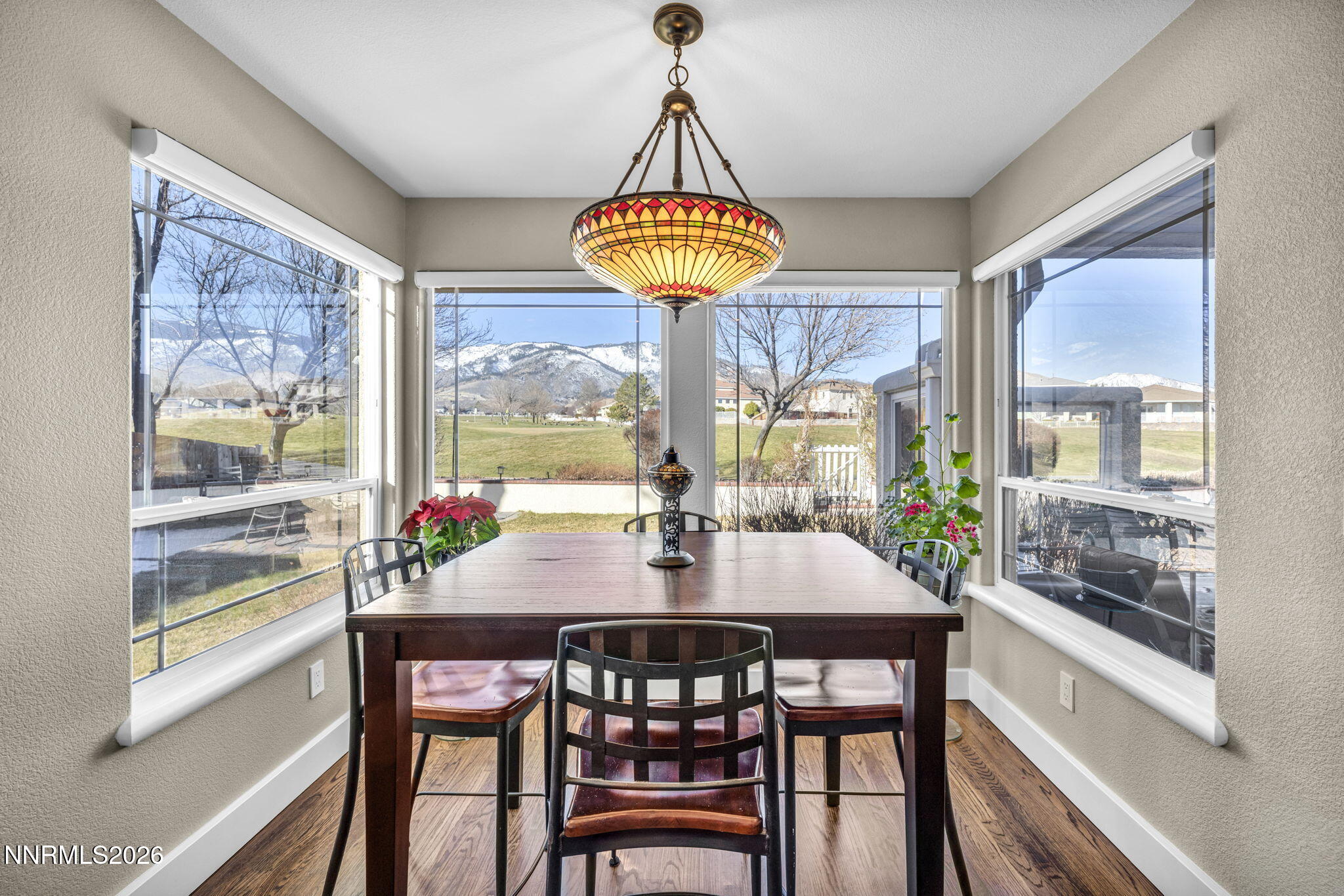 2296 Oak Ridge Drive Carson City, NV 89703 - Photo 24 of 71 a view of a dining room with furniture window and outside view