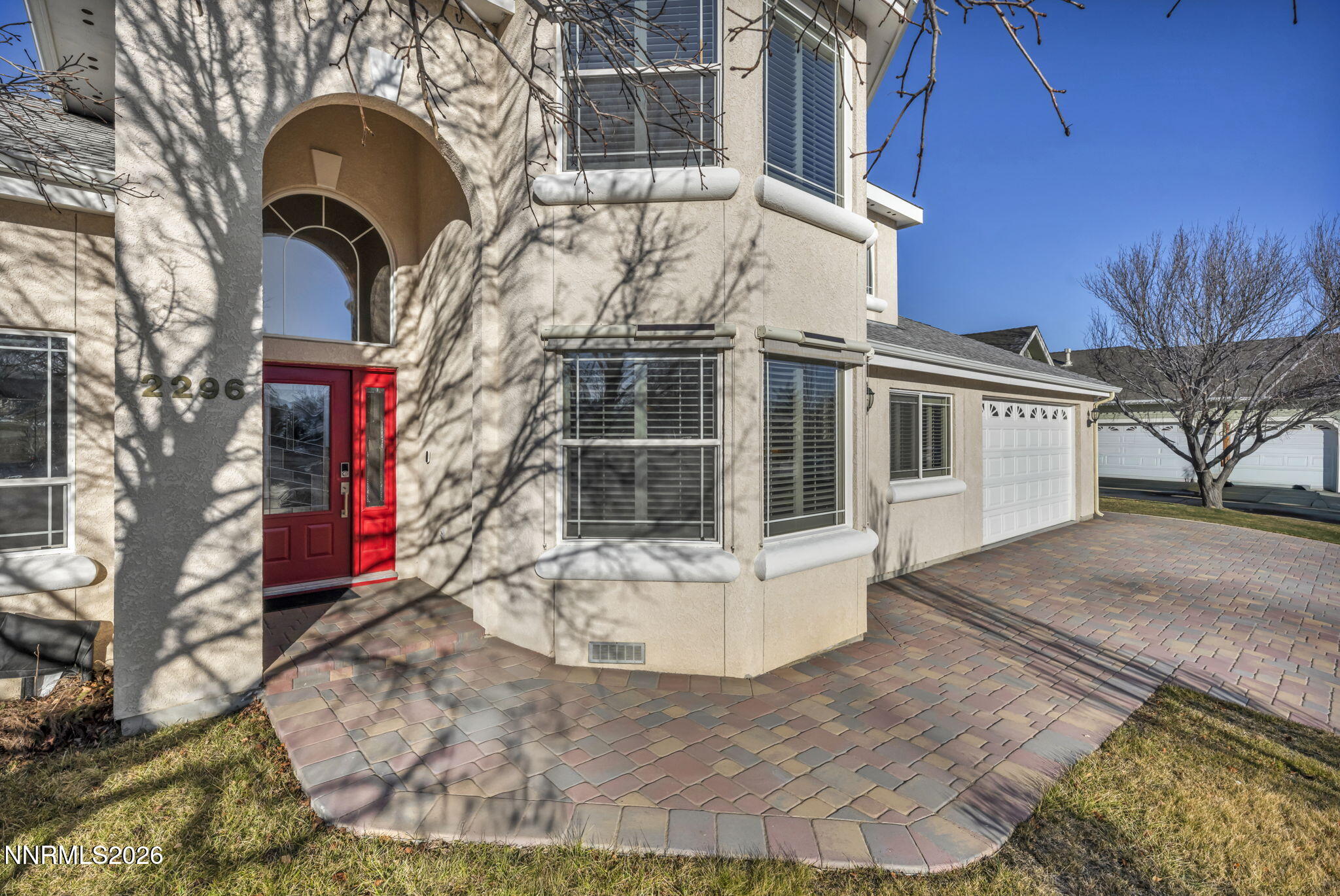 2296 Oak Ridge Drive Carson City, NV 89703 - Photo 68 of 71 a view of a house with a yard
