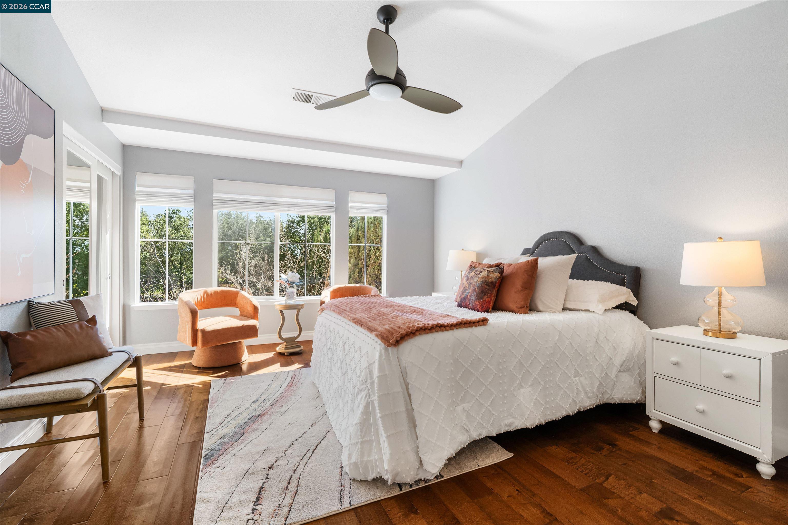 7151 Briza Loop San Ramon, CA 94582 - Photo 14 of 29 a bedroom with a large bed and a large window