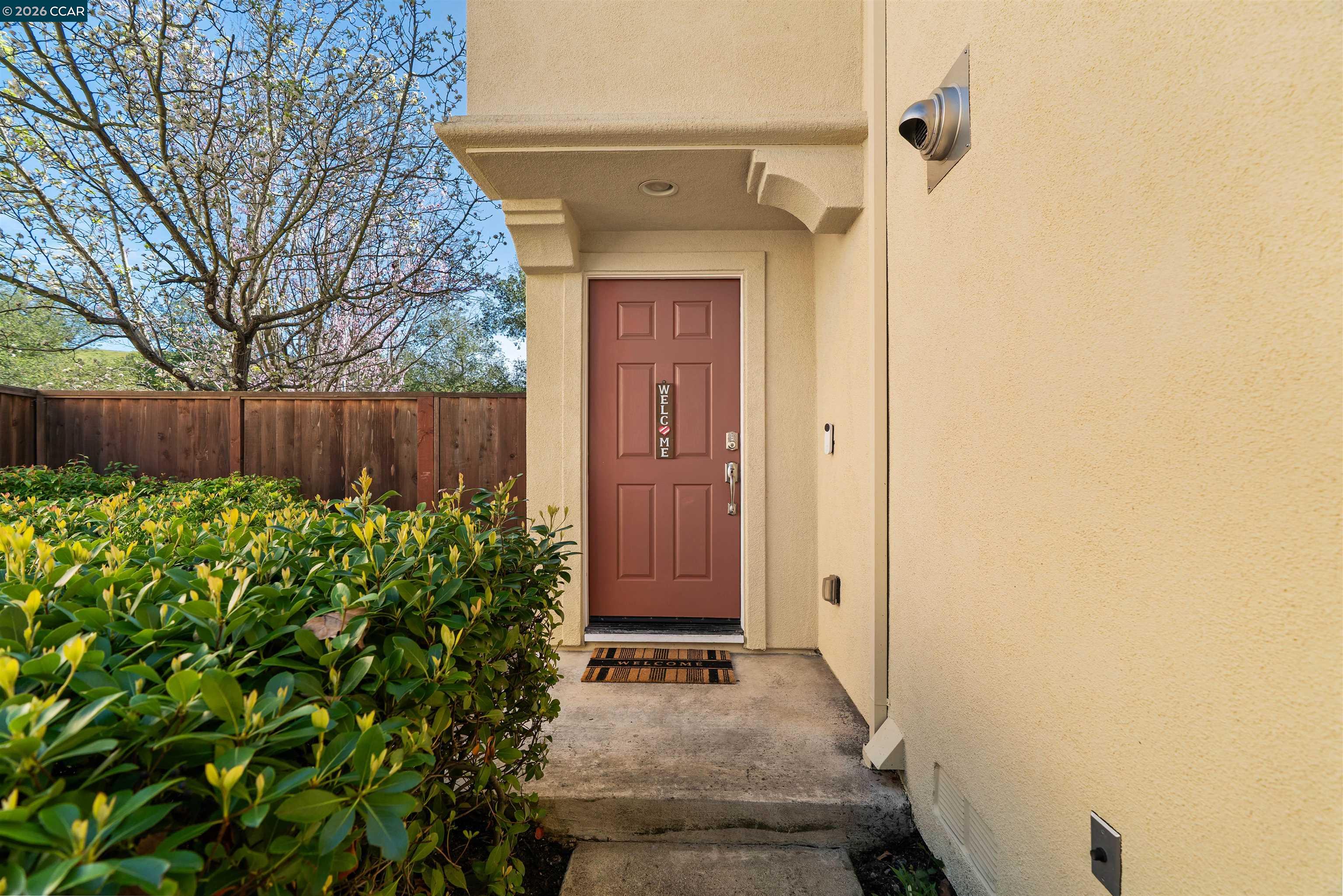 7151 Briza Loop San Ramon, CA 94582 - Photo 2 of 29 a front view of a house with garden