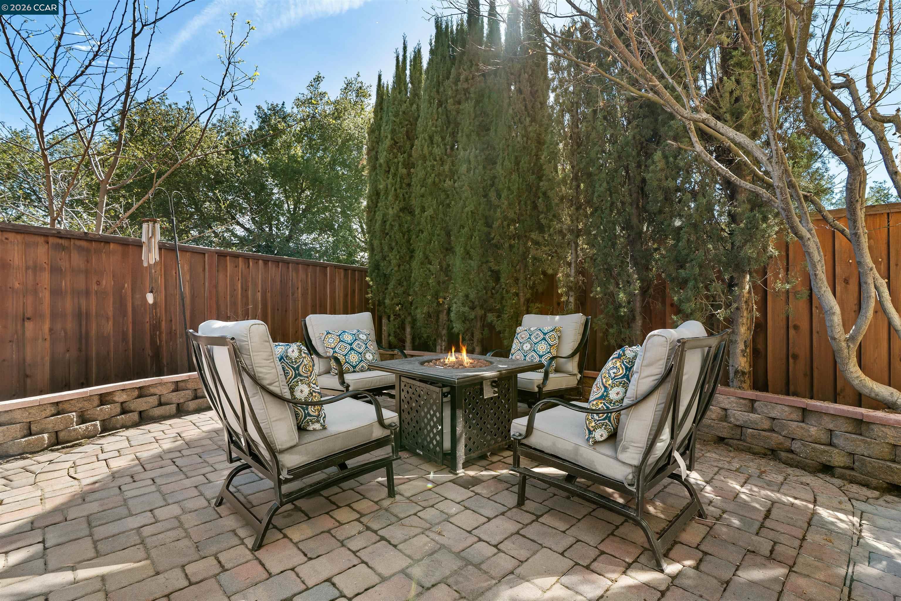 7151 Briza Loop San Ramon, CA 94582 - Photo 23 of 29 a view of a chairs and table in the backyard
