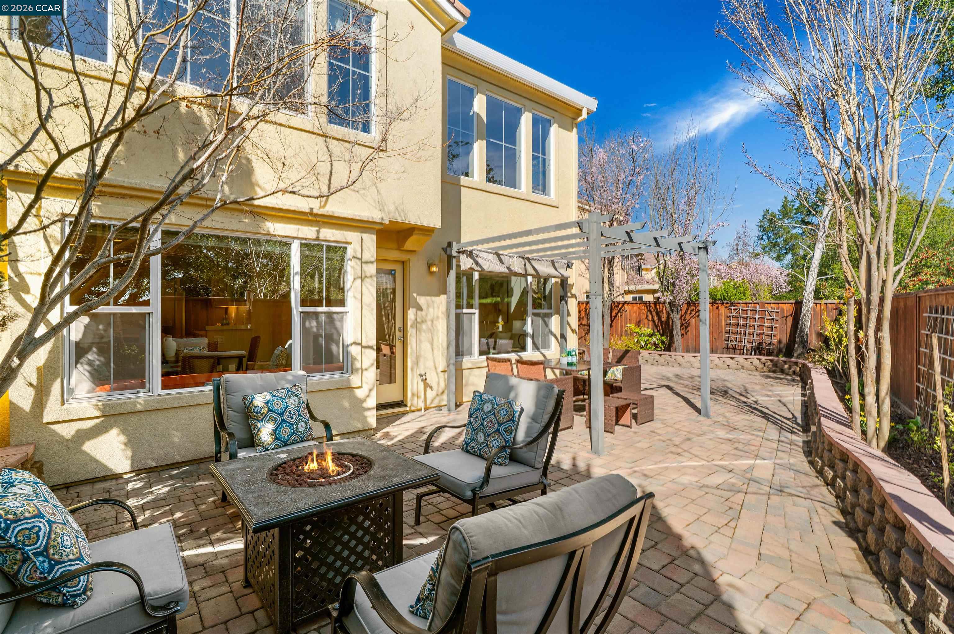 7151 Briza Loop San Ramon, CA 94582 - Photo 24 of 29 a view of a patio with couches table and chairs and potted plants
