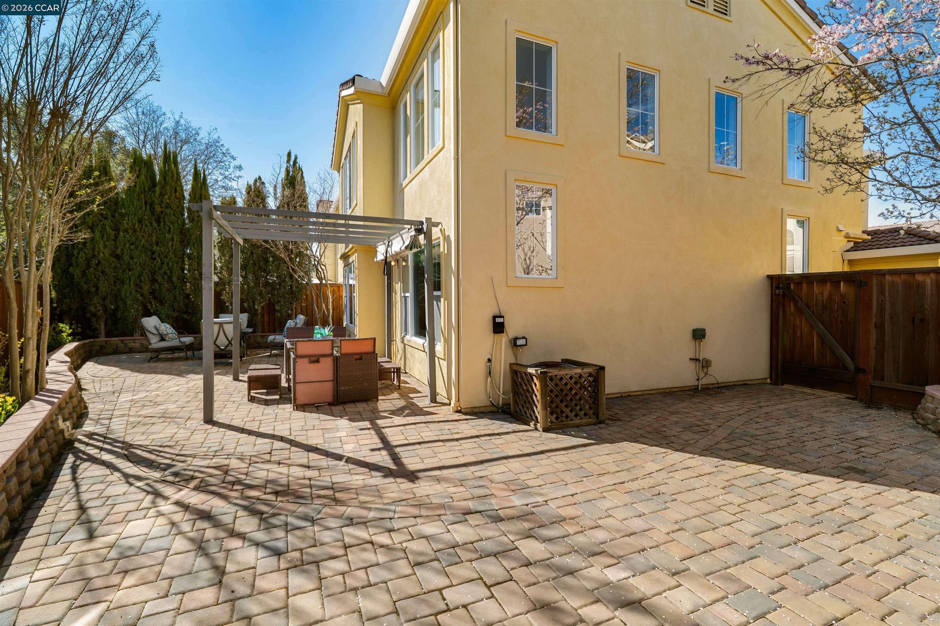 7151 Briza Loop San Ramon, CA 94582 - Photo 25 of 29 a view of a backyard with sitting area and furniture
