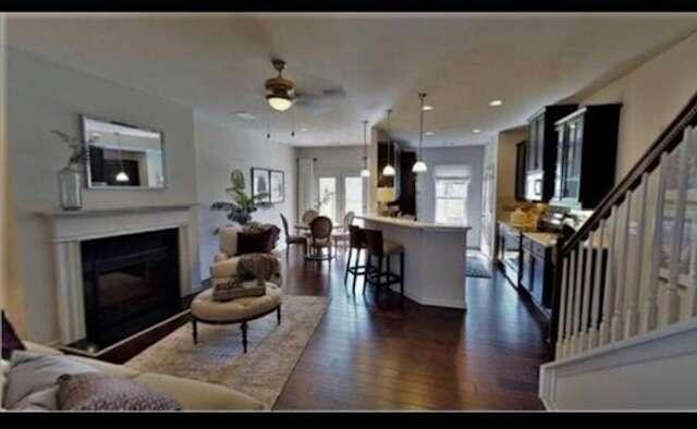 4281 Alden Park Drive Decatur, GA 30035 - Photo 1 of 1 a living room with furniture and a fireplace