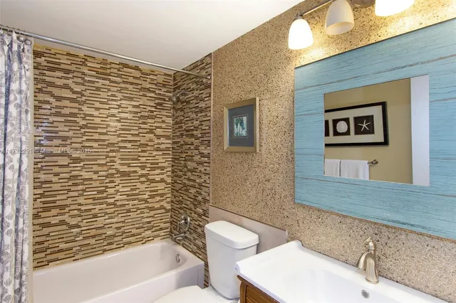 a view of a city with tall buildings