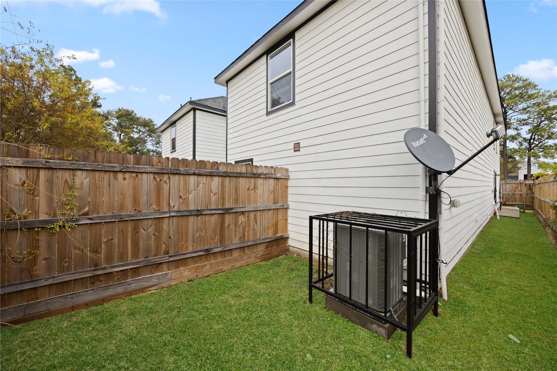 7804 Crestview Drive, Unit B Houston, TX 77028 - Photo 23 of 23 a view of a backyard with wooden fence