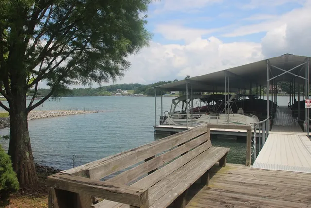 a view of a lake with sitting area