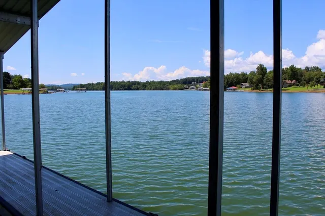 a view of a lake from a balcony