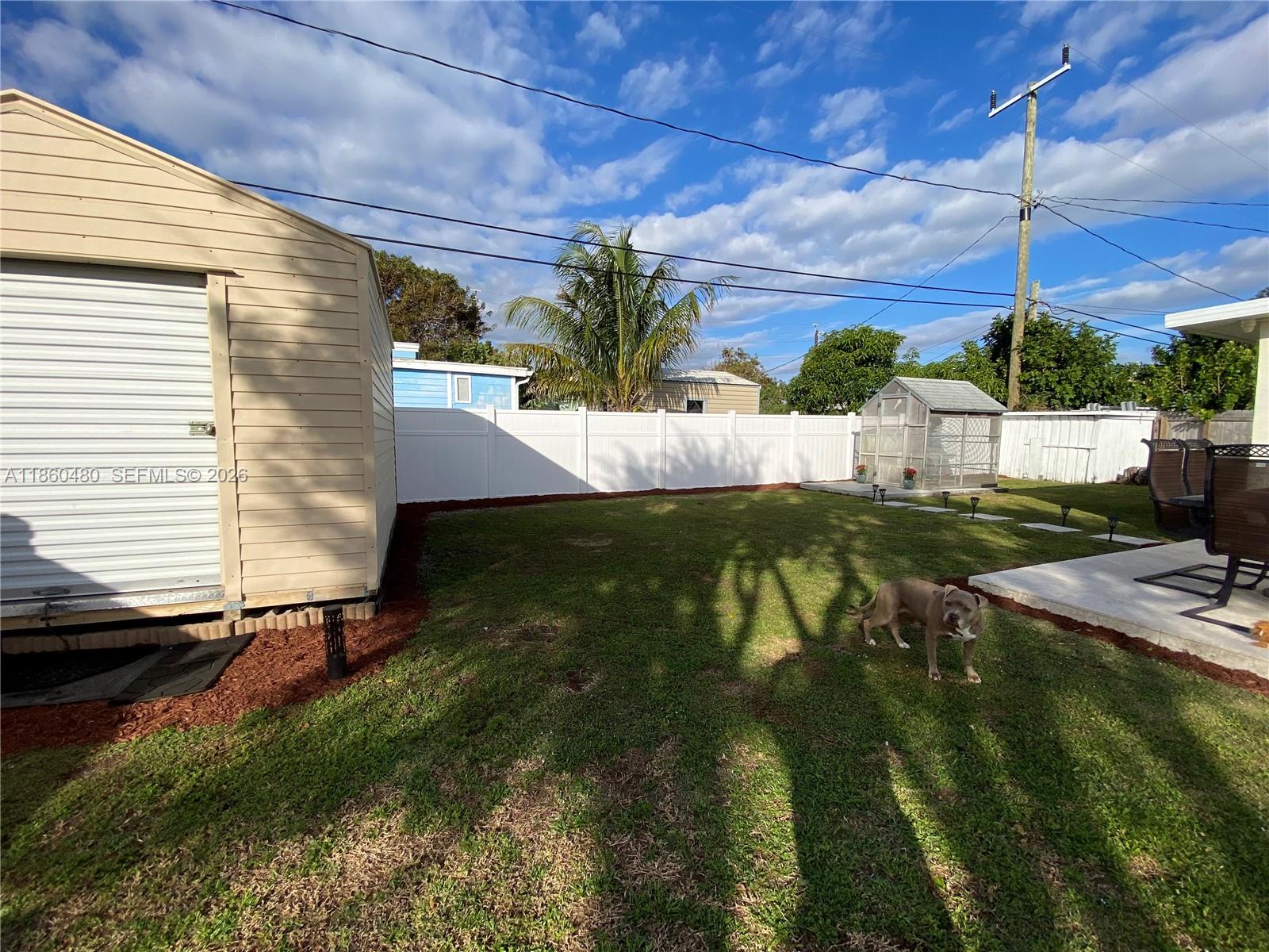 3781 Riedel Avenue Palm Springs, FL 33461 - Photo 25 of 25 a view of swimming pool with seating