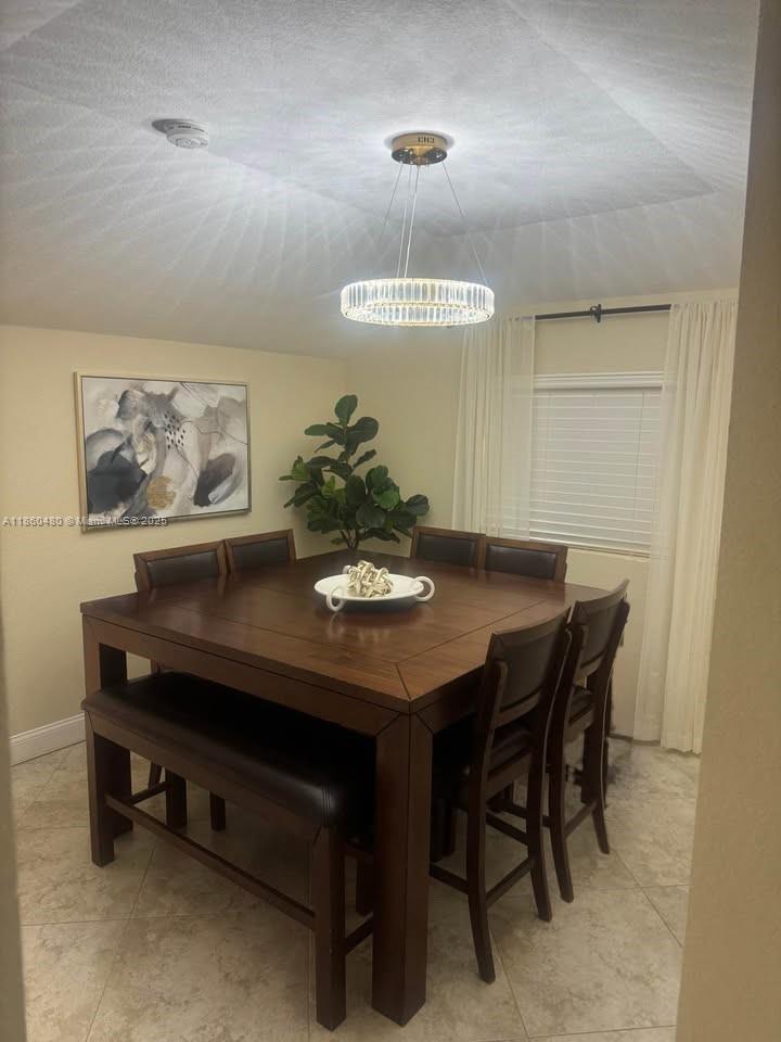 3781 Riedel Avenue Palm Springs, FL 33461 - Photo 5 of 21 a view of a dining room with furniture