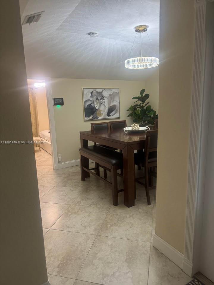 3781 Riedel Avenue Palm Springs, FL 33461 - Photo 7 of 21 a view of a workspace with furniture