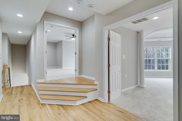 a view of a livingroom with wooden floor