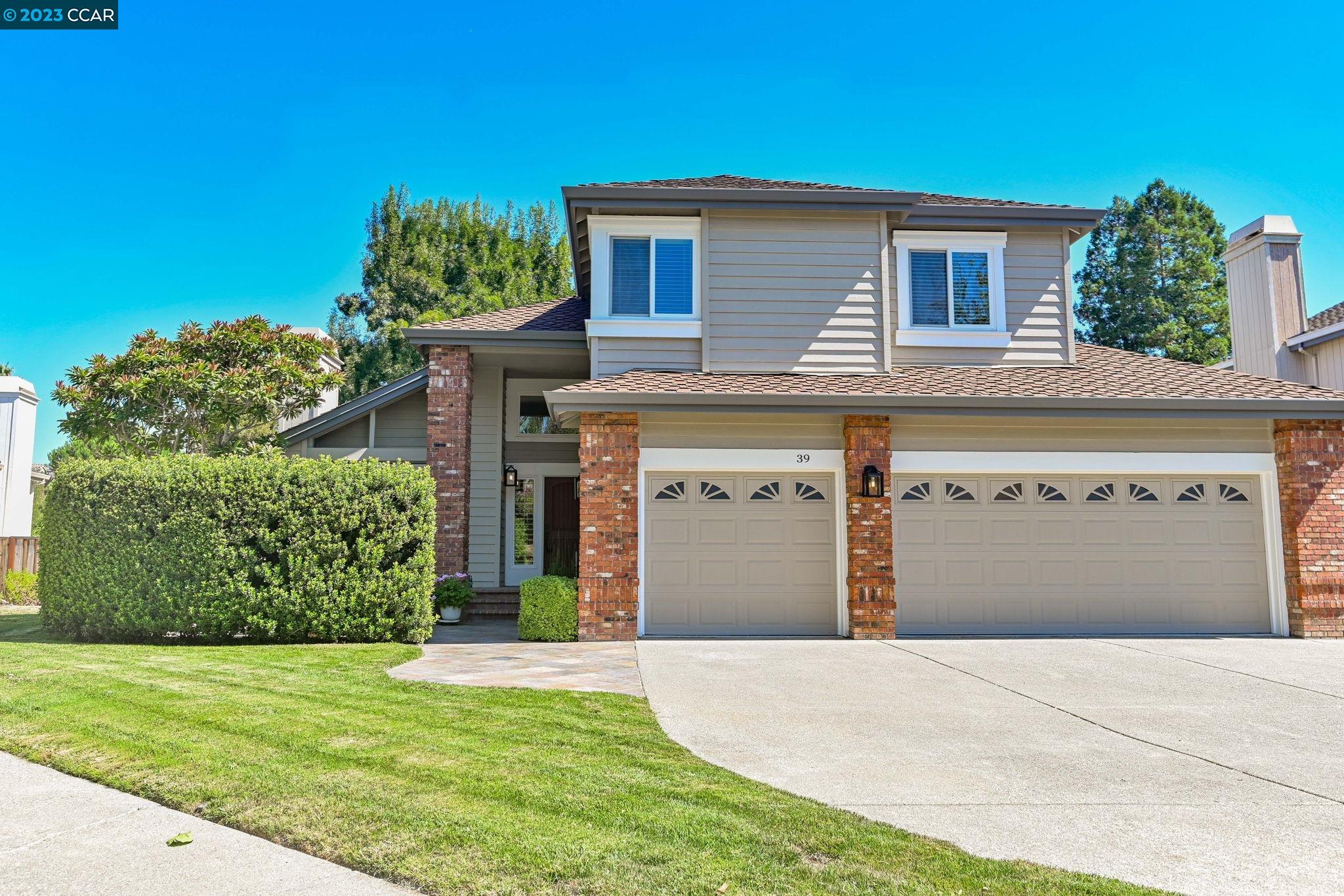39 Grand Canyon Lane San Ramon, CA 94582 - Photo 1 of 1 a front view of a house with a yard and garage