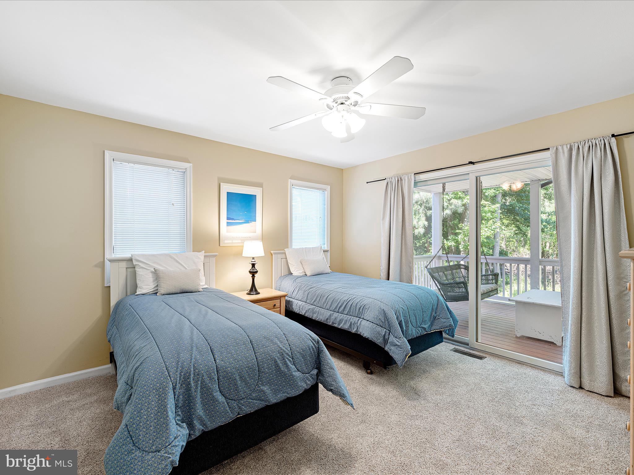 734 Deer Leap Drive, Unit 4 Bethany Beach, DE 19930 - Photo 43 of 53 Guest bedroom 4 with with covered deck access