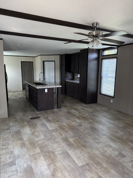 20410 Telge Road, Unit 11 Tomball, TX 77377 - Photo 13 of 30 a view of a livingroom with furniture and chandelier