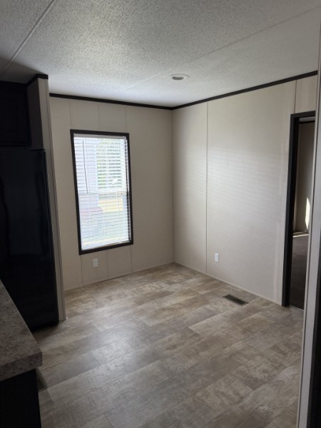 20410 Telge Road, Unit 11 Tomball, TX 77377 - Photo 16 of 30 an empty room with windows and closet