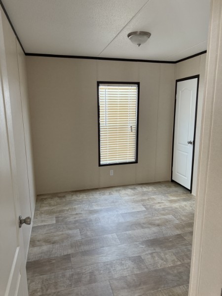 20410 Telge Road, Unit 11 Tomball, TX 77377 - Photo 23 of 30 a view of an empty room with a window