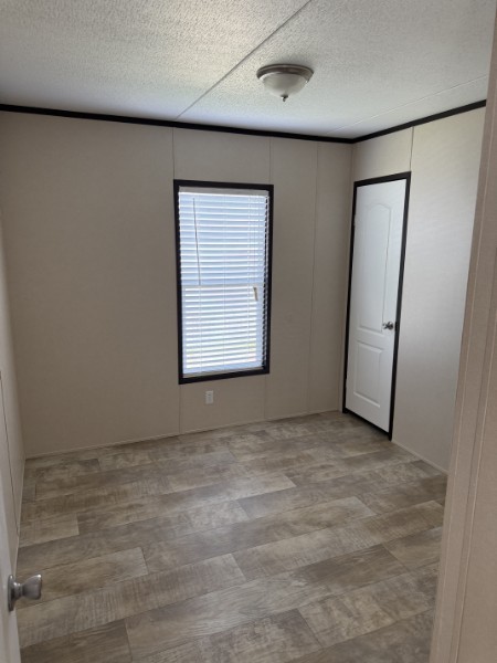 20410 Telge Road, Unit 11 Tomball, TX 77377 - Photo 25 of 30 an empty room with windows