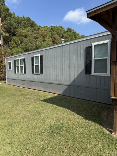 20410 Telge Road, Unit 11 Tomball, TX 77377 - Photo 4 of 30 a backyard of a house with large trees