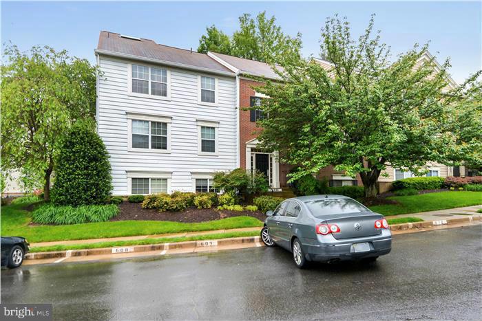 12009 Golf Ridge Court, Unit 202 Fairfax, VA 22033 - Photo 20 of 30 a car parked on the side of the road