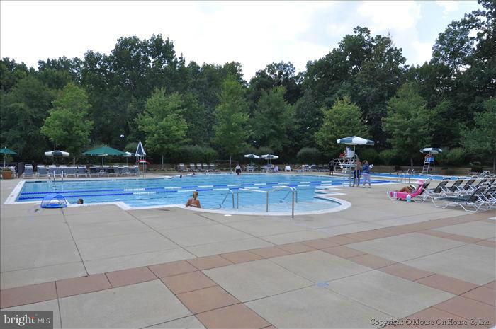 12009 Golf Ridge Court, Unit 202 Fairfax, VA 22033 - Photo 24 of 30 a view of outdoor space with pool and furniture