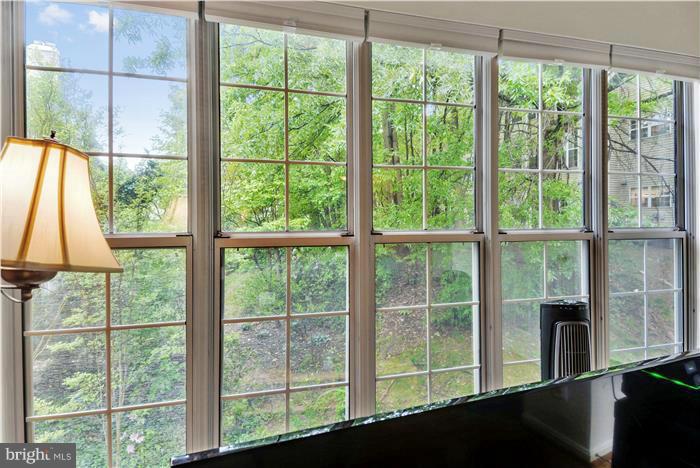 12009 Golf Ridge Court, Unit 202 Fairfax, VA 22033 - Photo 5 of 30 a view of a large window with an outdoor space