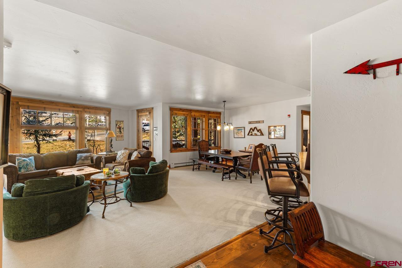 14 Hunter Hill Road, Unit A208 Crested Butte, CO 81225 - Photo 11 of 43 a view of a livingroom with furniture and gym equipment