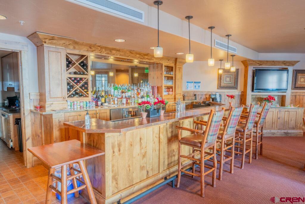 14 Hunter Hill Road, Unit A208 Crested Butte, CO 81225 - Photo 19 of 35 a very nice looking dining room with a table and chairs