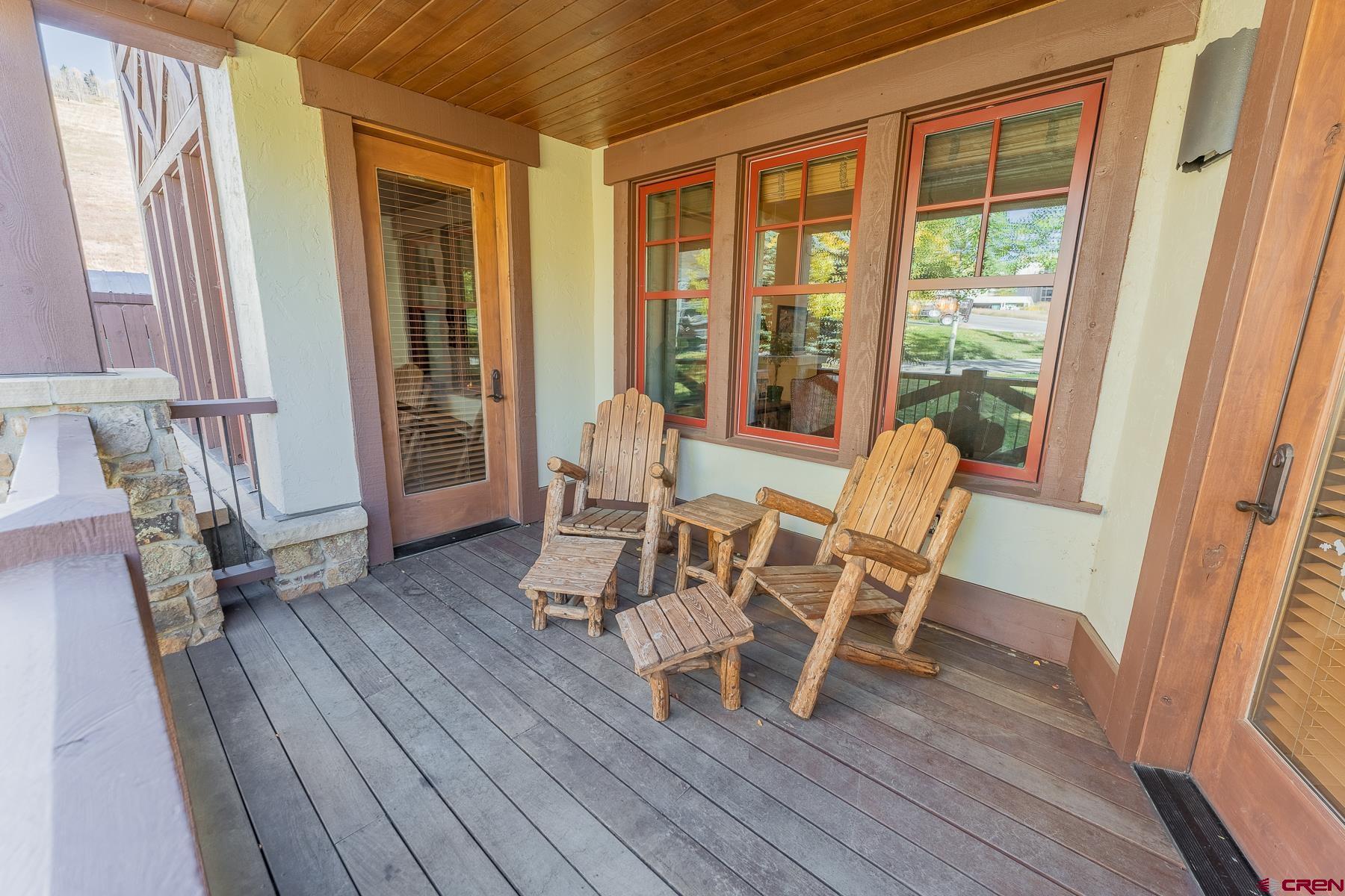 14 Hunter Hill Road, Unit A208 Crested Butte, CO 81225 - Photo 23 of 43 a view of a dining room with furniture and wooden floor