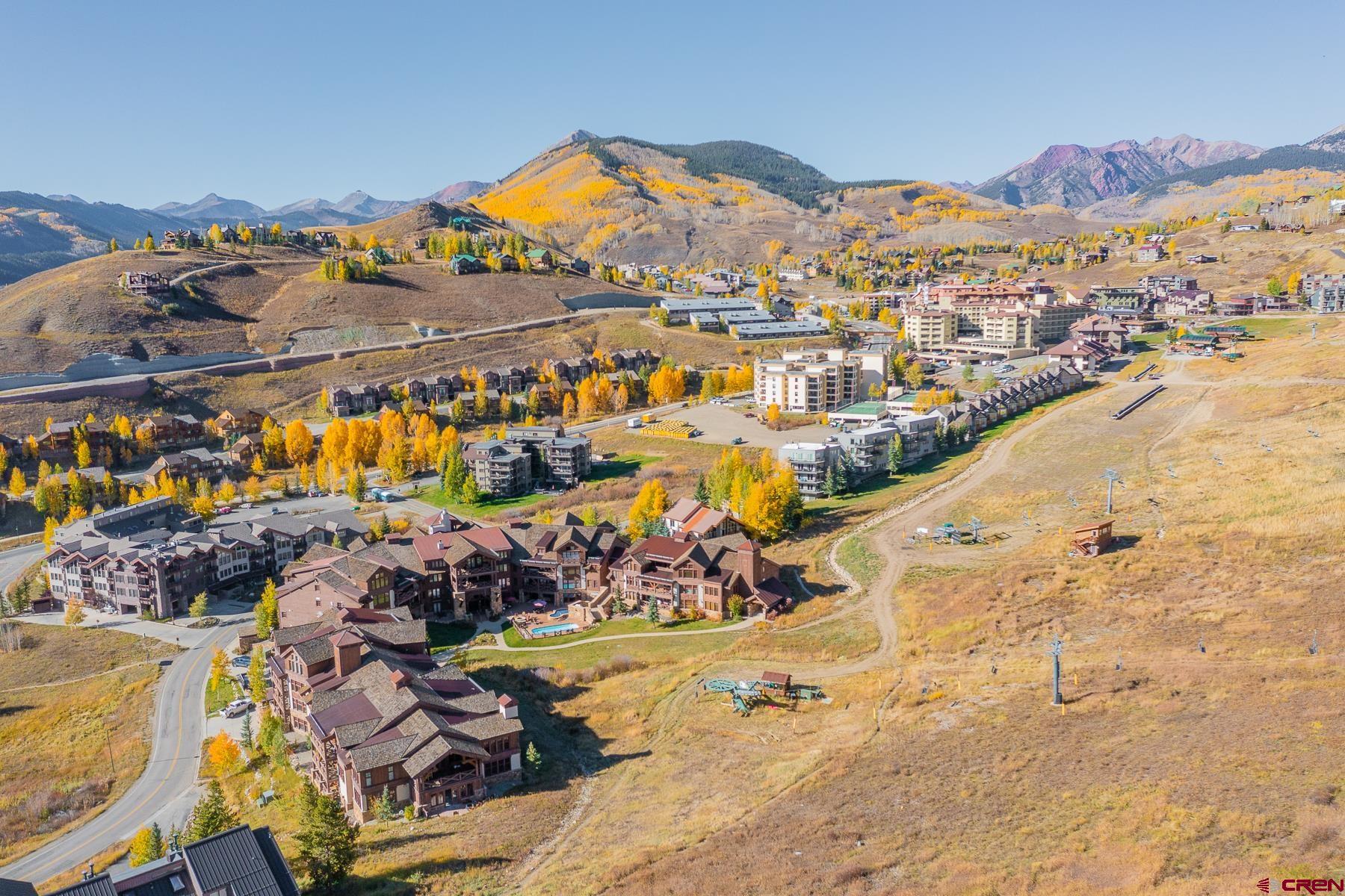 14 Hunter Hill Road, Unit A208 Crested Butte, CO 81225 - Photo 23 of 35 a view of a swimming pool with an outdoor seating