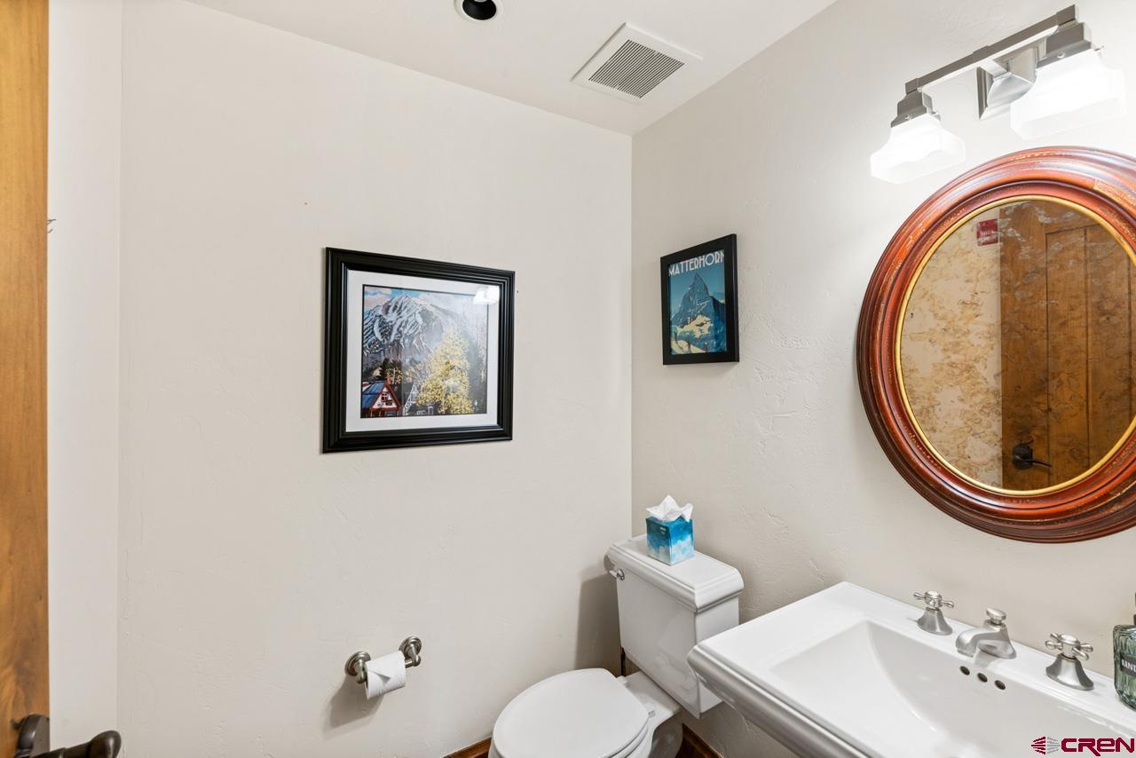 14 Hunter Hill Road, Unit A208 Crested Butte, CO 81225 - Photo 34 of 43 a bathroom with a sink and a mirror