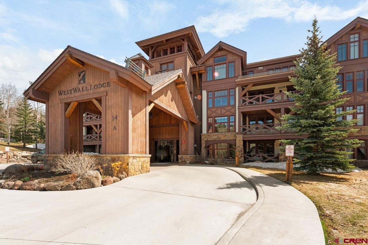 14 Hunter Hill Road, Unit A208 Crested Butte, CO 81225 - Photo 35 of 43 a view of a white building with a large windows