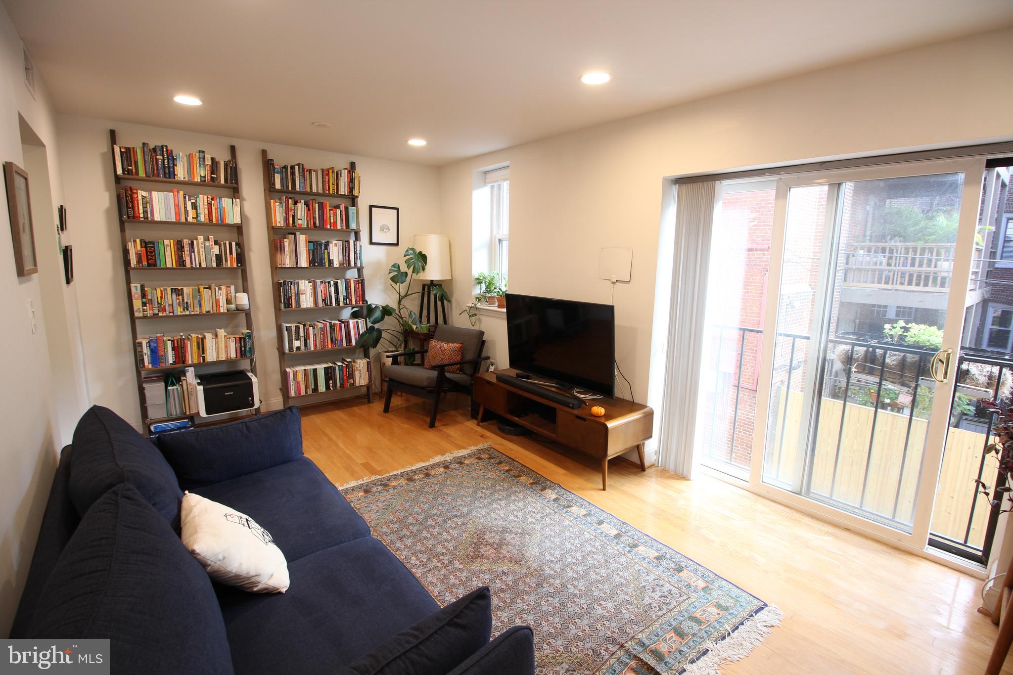 2630 Adams Mill Road Northwest, Unit 108 Washington, DC 20009 - Photo 2 of 16 Spacious living area with lots of natural light