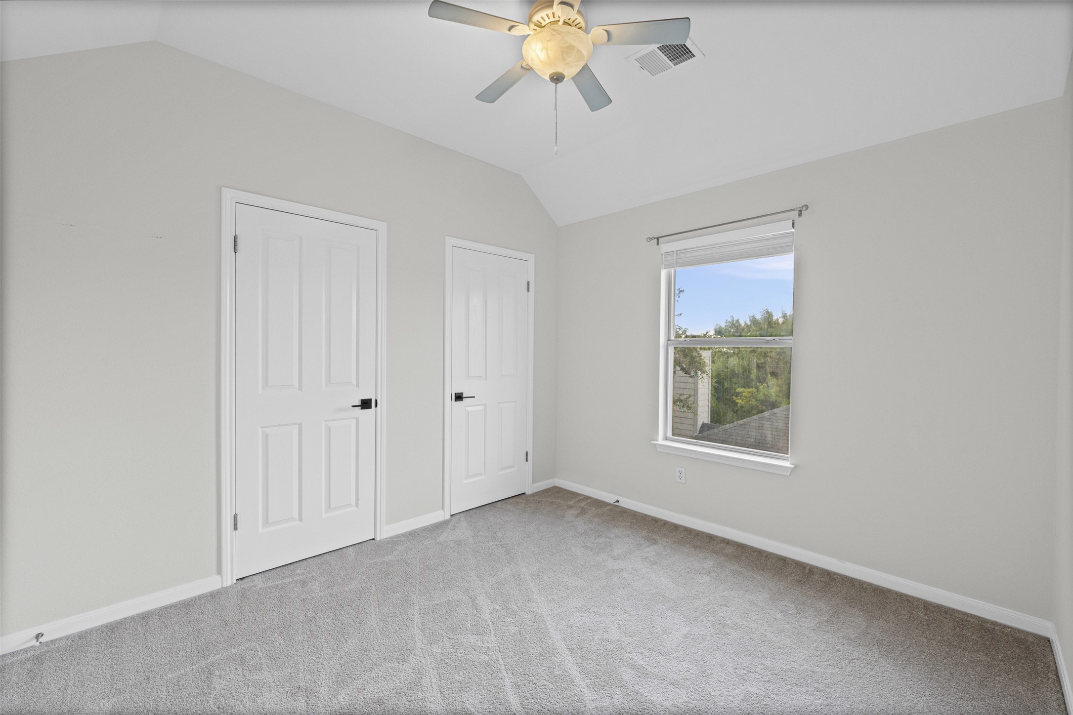 8820 Colberg Drive Austin, TX 78749 - Photo 27 of 35 A quiet retreat with a sun-filled window and soft carpeting, perfect for peaceful slumber.